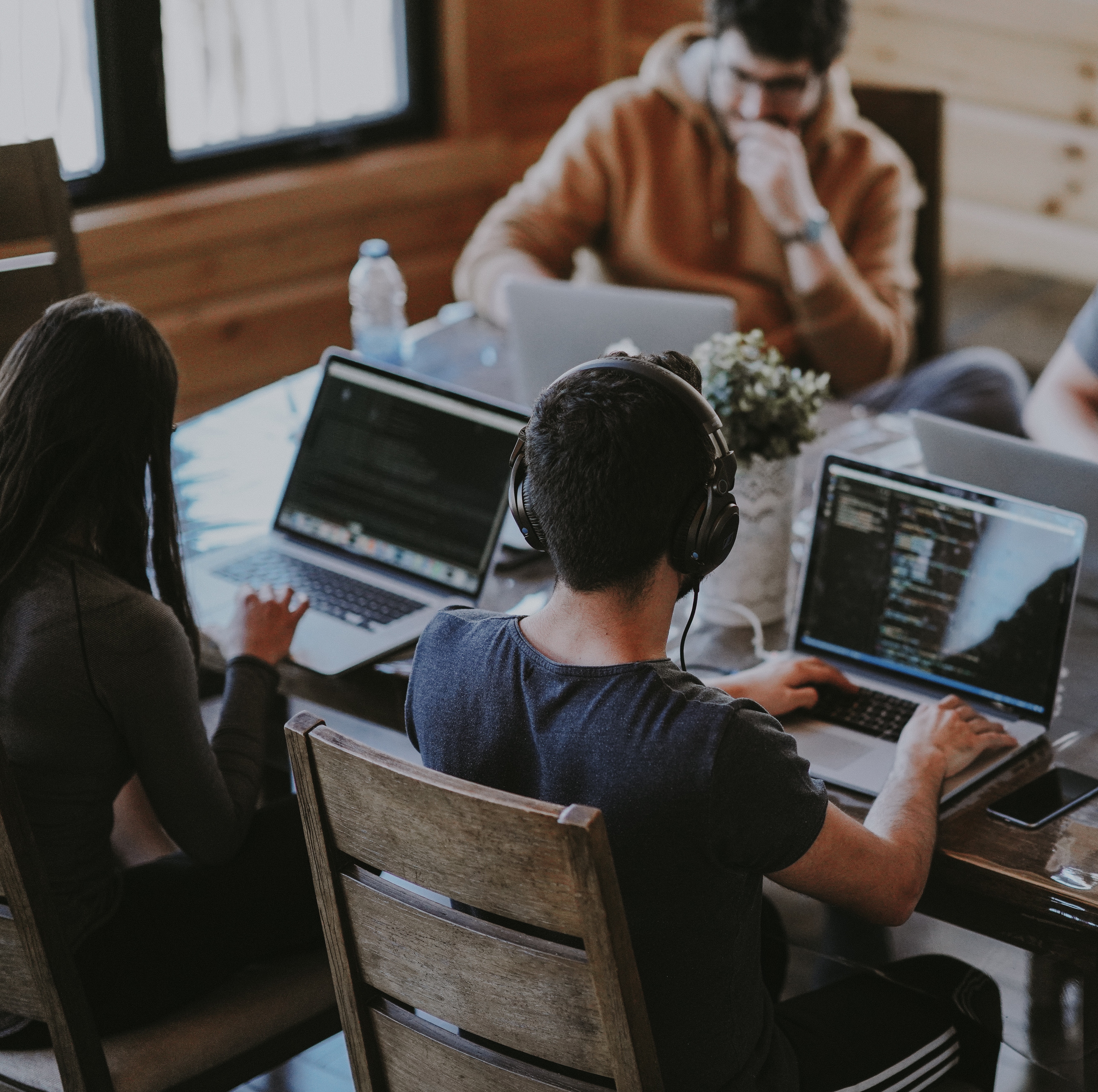 A group of people working at a table